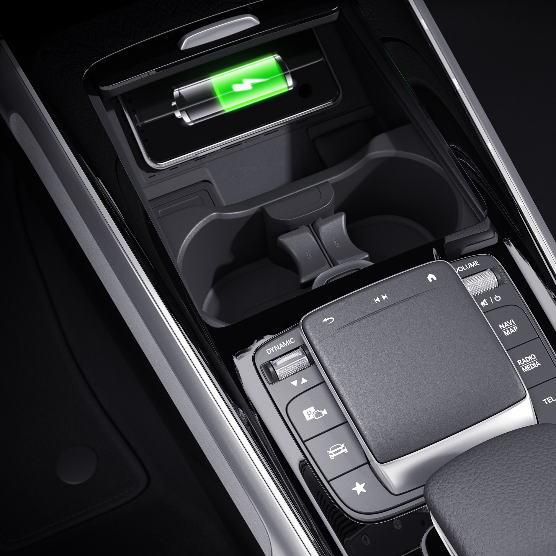 Carga inalámbrica | EQB | Mercedes-Benz El compartimento para la carga inalámbrica de dispositivos electrónicos en el compartimento multiuso delantero de la consola central de EQB de Mercedes-Benz