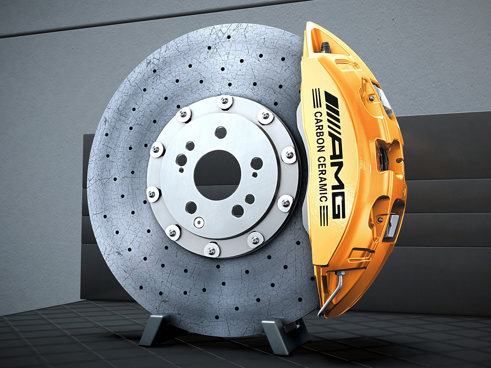 Sistema de frenos cerámicos de alto rendimiento AMG con discos compuestos | Tecnología e innovación de AMG | Mercedes-AMG Sistema de frenos de altas prestaciones AMG con discos de material compuesto.
